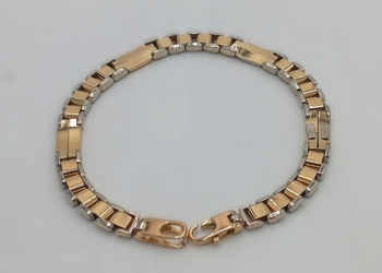 Bracciale in oro giallo e bianco in maglia piena