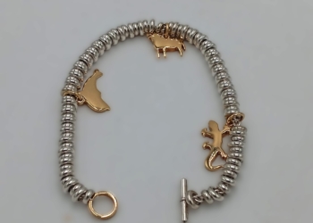 Bracciale DODO in argento con tre ciondoli in oro